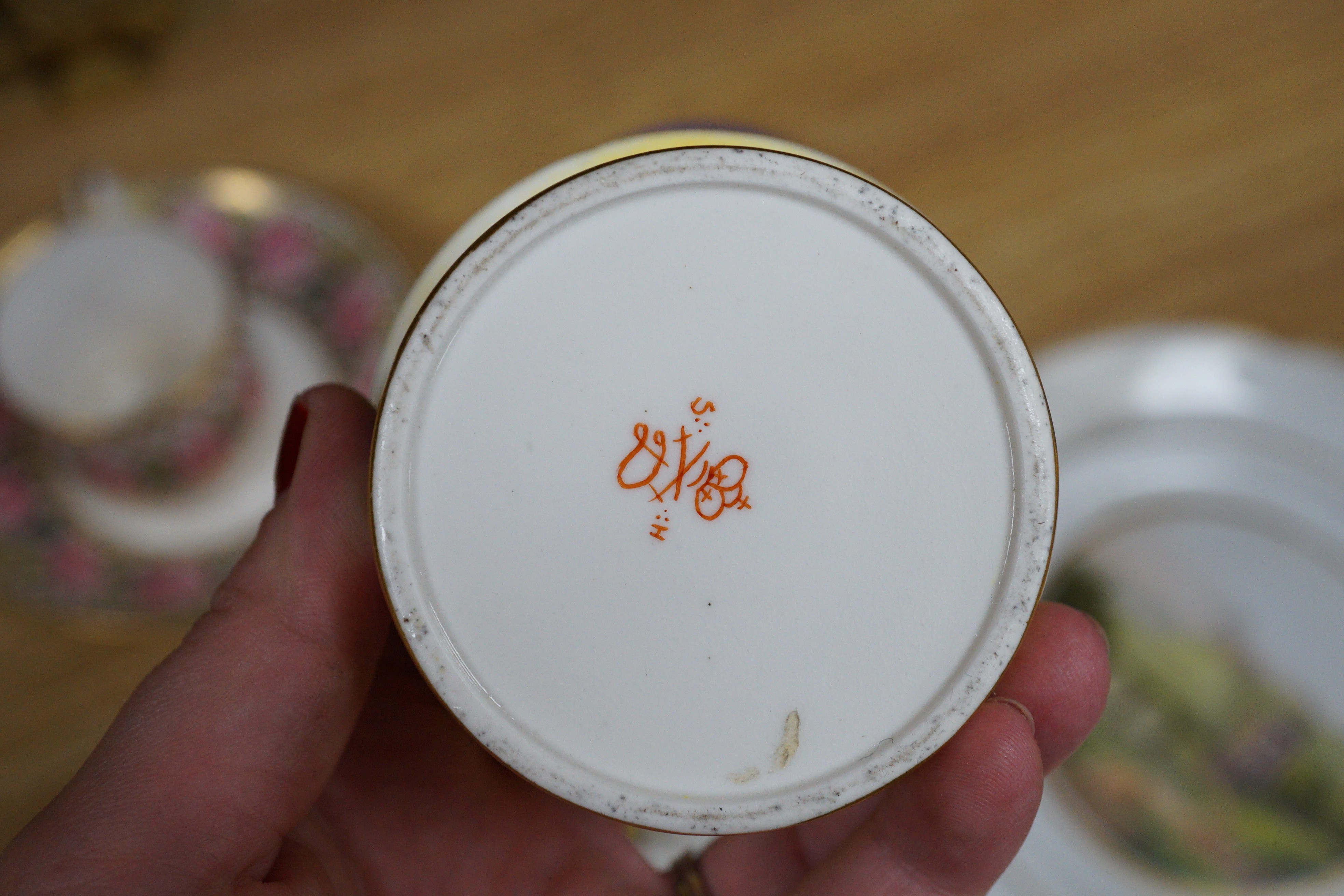 A Sampson Hancock Derby inkwell and cover, a similar coffee can, saucer and slop bowl, chantilly plate with basket-work border and four other items